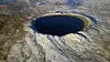 Pingualuit-krateret nord i Canada er 1,4 millioner år gammelt, 3,44 km i diameter og huser en 252 meter dyp innsjø. Foto: Nasa