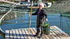 Trond Lindheim i Spilltech henter dagens fangst fra oppsamlingsløsningen PortBin. Foto: Marius Valle