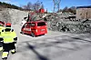 Statnett og Veidekke hevder å være først i verden med et fossilfritt tunnelprosjekt. I bakgrunnen ses inngangen til den 4,5 km lange kabeltunnelen. Foto: Knut Bjørheim