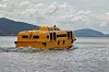 Catamaran Rescue Vessel fra den gang bedriften het Umoe Schat Harding, bygget for RCCL-cruiseskip i Oasis-klassen. Nå er Palfinger eier av bedriften.