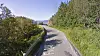 Fylkesvei 848 på sørsiden av Rolla, litt øst for Sørrollnes.