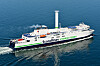 To måneder drift med rotorseil viser drivstoffbesparelse på 4-5 % for MV Copenhagen. Den er hybrid med en 1.5 MWh batteripakke fraCorvus.