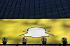Logoen til Snapchat vises på Times Square i New York. Mobilapplikasjonen har hatt enorm vekst siden starten.