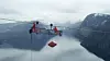 Man kan ikke ha høydeskrekk hvis man skal bygge eller vedlikeholde kraftlinjer. Men nå mener NVE og Energi Norge at også prisen er for høy. Bilder er fra utskifting av flymarkører over Hellemofjorden i 2003.