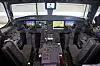 Bortsett fra at fem mindre skjermer er blitt til fire store, er cockpit på E2 så og si identisk med E1. Foto: Per Erlien Dalløkken
