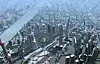 SHANGHAI WORLD FINANCIAL CENTER: Bygget med det lille hullet i toppen skal stå ferdig i 2007 og vil være på 492 meter. Publikum vil få en egen plattform i dette kikkehullet. Det rosa TV-tårnet til venstre i bildet er 468 meter høyt og er det høyeste TV-tårnet i Asia.