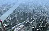 SHANGHAI WORLD FINANCIAL CENTER: Bygget med det lille hullet i toppen skal stå ferdig i 2007 og vil være på 492 meter. Publikum vil få en egen plattform i dette kikkehullet.