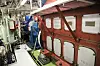 MaK-motor med seks sylindre og 1,98 MW effekt. Den måtte flyttes et godt stykke forover for å få plass til gir og større akselgenerator.
