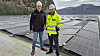 Daglig leder Idar Heskestad og prosjektleder Håkon Hansen i Norsk Spennbetong på taket med 2900 øst- og vestvendte solcellepaneler.
