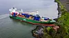 Det 135 meter lange konteinerskipet NCL Salten gikk tidlig torsdag på grunn i Trondheimsfjorden utenfor Byneset. Det havnet delvis på land ved en bolig.