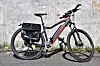 Ble rigget for langkjøring: En slik Buddy Bike ble modifisert med tre batterier for å klare de lange dagsetappene og utstyrt med punkteringsfrie dekk. Foto: Buddy Electric