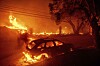 Både biler og bygninger er totalødelagt i brannen i Los Angeles. Minst 16 menensker har så langt mistet livet.