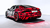 Audi E-Tron GT vises med den karakteristiske E-Tron-kamuflasjen.