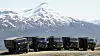 Scania-lastebiler parkert i Mauken skytefelt i 2002. Foto: Torgeir Haugaard / Forsvaret