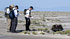 Kurator for astromaterialer, Francis McCubbin, vitenskapelig sjef for returkapselprøver, Scott Sandford og hovedetterforsker for Osirix-Rex ved University of Arizona, Dante Lauretta, samler data returkapselen fra Nasas Osiris-Rex-programmet etter at kapselen landet ved det amerikanske forsvarsdepartementets Utah Test and Training Range søndag 24 september. Prøvene som kapselen har prakt med seg, ble Hentet fra asteroiden Bennu i oktober 2020
