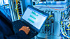 Fix network switch in data center room .