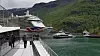 Yrende liv i Flåm i Aurlandsfjorden, en av fem på UNESCOs liste over Verdensarvfjorder. Fra 2026 er det bare Future of the Fjords (t.v.) som tilfredsstiller krav til nullutslipp. Foto: Tore Stensvold