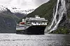 Havila Castor viste 2. juni 2022 at det er mulig å seile utslippsfritt i Geirangerfjorden. Med 6,1 MWh batterier og sakte fart, kan skipet seile i fire timer uten utslipp. Foto: Marius Beck Dahle