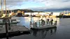 NTNUs autonome urbanferge Milliampere 2 legger til kai i Ravnkloa i Trondheim. Ved hjelp av sensorer som radar, lidar, kamera og ultralyd kan fergen oppfatte og unngå kollisjoner med land og bevegelige objekter, og dermed frakte passasjerer trygt frem og tilbake over Kanalen. Foto: NTNU