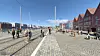 Illustrasjon av hvordan dagløsningen over Bryggen i Bergen kan se ut. Men mastene og kjøreledningene er ikke inkludert i den nyeste planen for Bybanen. Illustrasjon: Norconsult/Asplan Viak