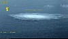 In this picture provided by Swedish Coast Guard, the gas leak in the Baltic Sea from Nord Stream photographed from the Coast Guard's aircraft on Wednesday, Sept. 27, 2022. A fourth leak on the Nord Stream pipelines has been reported off southern Sweden. Earlier, three leaks had been reported on the two underwater pipelines running from Russia to Germany. (Swedish Coast Guard via AP)