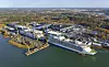 Verftet i Åbo 2009. Den gang eid av STX. Ved kai ligger Oasias of the Seas, levert høsten 2009, mens Allure of the Seas fortsatt ligger i tørrdokk. Det ble levert til RCL i 2010.