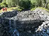 Flomskredgjerde stopper steinskred.