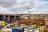 3500 personer er sysselsatt på Femern-prosjektet akkurat nå. Her, i tunnelportalen på dansk side, jobber 250 av dem for å få alt klart til det første tunnelelementet skal senkes til havbunnen i fjerde kvartal i år. Foto: Mona Strande