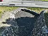 Skredgjerdet som stopper steinen gjør at også magasinet nede ved veien fungerer mye mer effektivt. Foto: Statens vegvesen