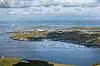 Nova Sea Havbruks oppdrettsanlegg på Træna på Helgelandskysten. Konsernet solgte 42.000 tonn med laks i 2024. Generelt ser sjømatnæringen optimistisk på framtida. Foto: Cornelius Poppe