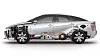 Elbil på hydrogen: Selve brenselcellen tar ikke mye plass. Det er plassert midt i bilen foran den fremste hydrogentanken som ligger under baksetene. Det som ligger under panseret er pumper, kompressor og annen utrustrning som trengs til gassvekslingen. I fremtidige modeller vil brenselcellen og utrustningen ta mindre plass. Foto: Toyota