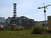 MÅ SKIFTES: Betonginnkapslingen som i dag dekker reaktor 4 ved Tsjernobyl, har lenge vært klar for utskifting.