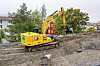 Elektrisk gravemaskin i gang med ny miljøgate på Gran på Hadeland.