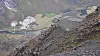 En av GNSS-mastene høyt over Romsdalen med E136 og Raumabanen.