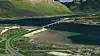 Den nye E8 legges på vestsiden av Ramfjorden, som så skal krysses med bru.