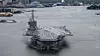 Etter ti måneders vedlikehold forlot USS Harry S. Truman Norfolk-verftet i mai 2021 med «Give 'em hell» malt på baugen. Dette er en referanse til slagordet støttespillerne til USAs 33. president brukte. Foto: Petty Officer 2nd Class Steven E