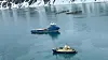 MS Virgo (i forgrunnen) grunnstøtte i Fuglefjorden på Svalbard. Polarsyssel kom rask til stedet med oljevernutstyr.