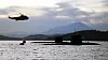 To malaysiske Scorpene-ubåter og et Sea King-helikopter.