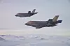 Her flyr RNorAF F-35A-flyene 5150 og 5149 over Rondane. Bilde: Morten Hanche / Forsvaret