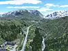 Dronebilde av fjellet ved Hesjabakkmyrane. Tunnelen skal gå inn i fjellet til venstre.