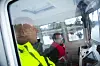 Røter Froder westervik (t.v) og Erlend Eide på vei til oppdrettsanlegget i Fensfjorden i lokasjonsbåten Langøy. Foto: Arne Fenstad