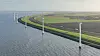 Den ikoniske vindparken Irene Vorrink i Nederland skal dekommisjoneres. Norske Gjenkraft har fått i oppdrag å gjenvinne materialet i 56 av bladene fra parken. Foto: Jorrit Lousberg