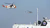 Her er både en Sea King fra 330-skvadronen og en NH90 fra Kystvakten i aksjon over havaristen MF Værøy. Foto: Eirik Helland Urke