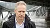 Samferdselsminister Jon-Ivar Nygård ved jernbanebrua Randklev bru ved Ringebu som falt ned under flommen etter uværet Hans.