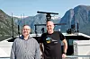 Alf Møllerud i Emcom sammen med Geir Inge Tufte fra Flåm AS på taket av Future of the Fjords.