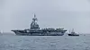 Hangarskipet Charles de Gaulle på vei inn mot Malmö onsdag. En drone skal ha blitt avskjært 13 kilometer fra skipet, og Sverige mistenker at den kom fra et russisk militærskip.