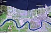 New Orleans fotografert med MODIS fra NASAs Terra-satellitt bare tre dager før Katrina raserte området. Store deler av New Orleans ligger lavere enn havoverflaten og bredden på Mississippi, bare beskyttet av høye voller og diker. Under orkanen brøt både diker og voller sammen flere steder.