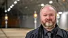 Ole W. Mortensen i Bybanen Utvikling har veddet med en kollega om planene for selvkjørende bane. – Men det er nok et veddemål som har mer visjon enn virkelighet i seg, sier han. Foto: Marius Valle