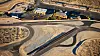 Den delvis pensjonerte internettgründeren John Morris kjøpte den opprinnelige Spring Mountain Motorsports Ranch i 2004. Etter å ha et kjøpt opp et 600 mål stort område på vestsiden i fjor, bygger han nå ut racingbanen. Når den står ferdig får han minst 24 kilometer med privat bane - som vil være verdens lengste.