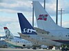 Fly haler flyhale sas, braathens, norwegian logoer på fly gardermoen
